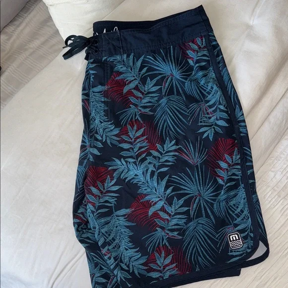 Travis Mathew Navy and Red Tropical Print Board Shorts